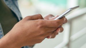 Person holding a phone.